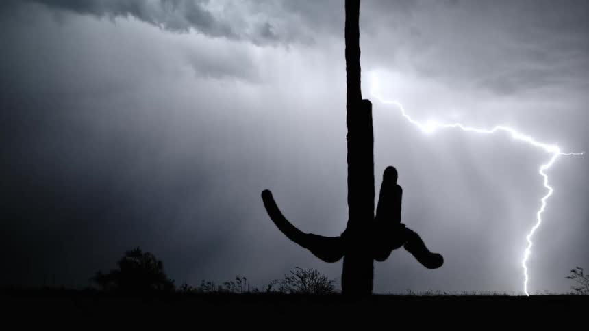 Lightning strike over the desert at night