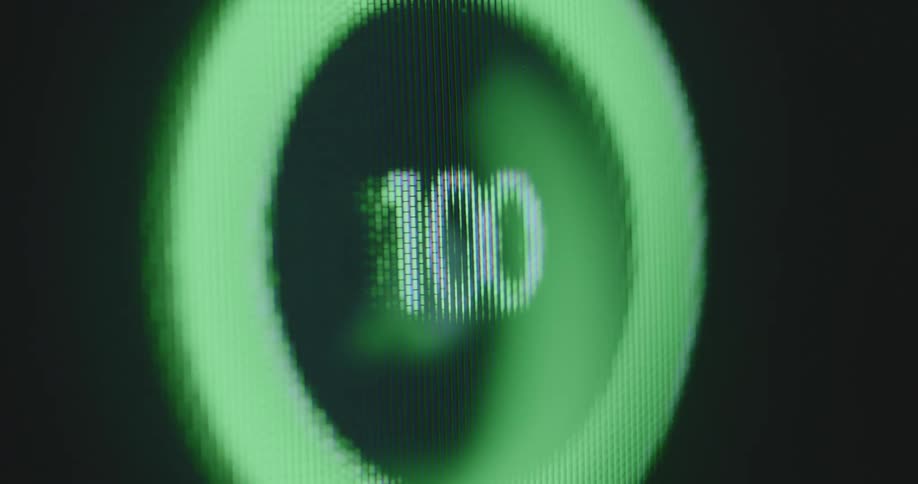 A round circle screen loading progress reaching 100 and then resetting back to 0 representing a download or upload process being completed and reversed on a computer or smartphone screen with pixels