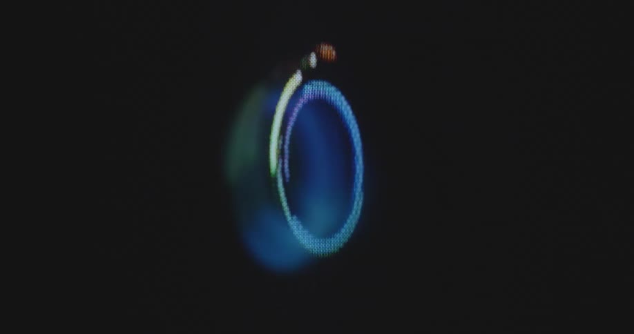 Digitized multi-colored color wheels symbolizing the LGBTQ+ community rotate on black retro tube television screen representing the diversity of a diverse society with equal opportunities for everyone