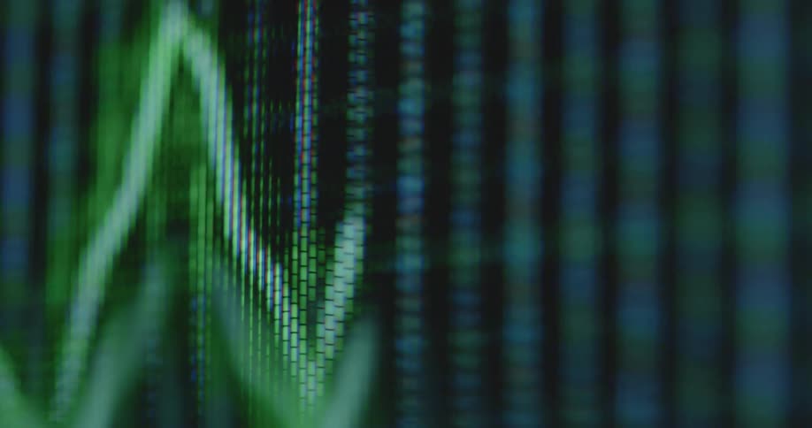 Shaky handheld dynamic extreme macro footage of a neon green line that goes up and down like a stock graph on a day trading platform on a pixelated computer screen with a grid structure