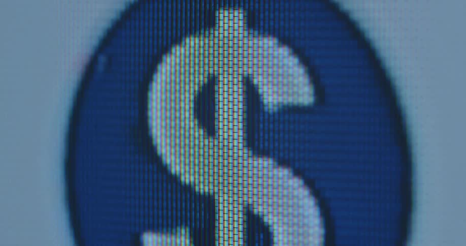 A red line spins around a white digital US dollar or $ bill icon or symbol animation in a blue circle representing the colors of the American flag on a pixelated smartphone screen with glitches