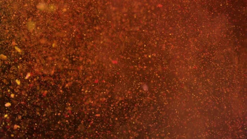 A bright pink powder is intersected by a yellow powder