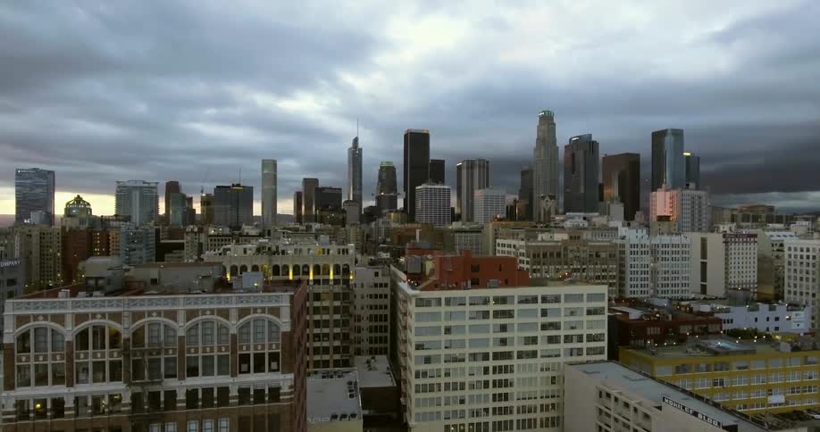Storm clouds float over Los Angeles skyscrapers