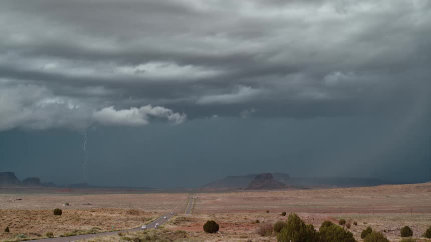 Road with vehicles and strong thunder