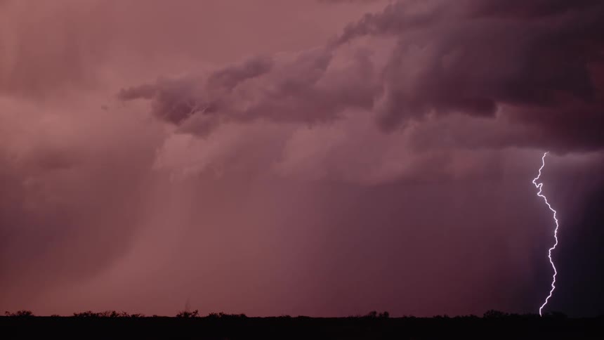 Lightning strikes from a cloudy sky