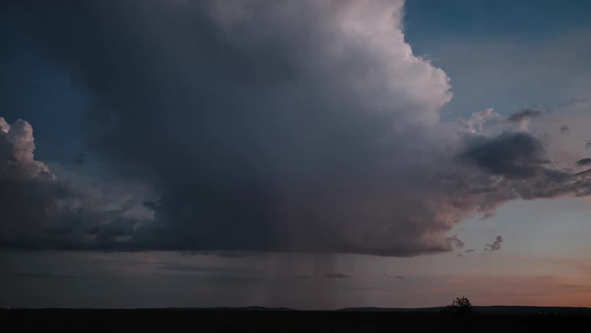Lightning and rain fall from the clouds