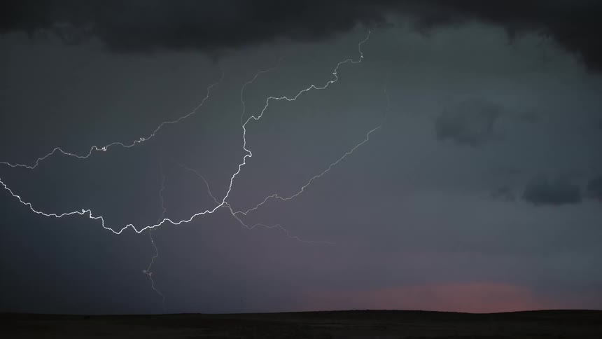 Lightning spreads through the sky