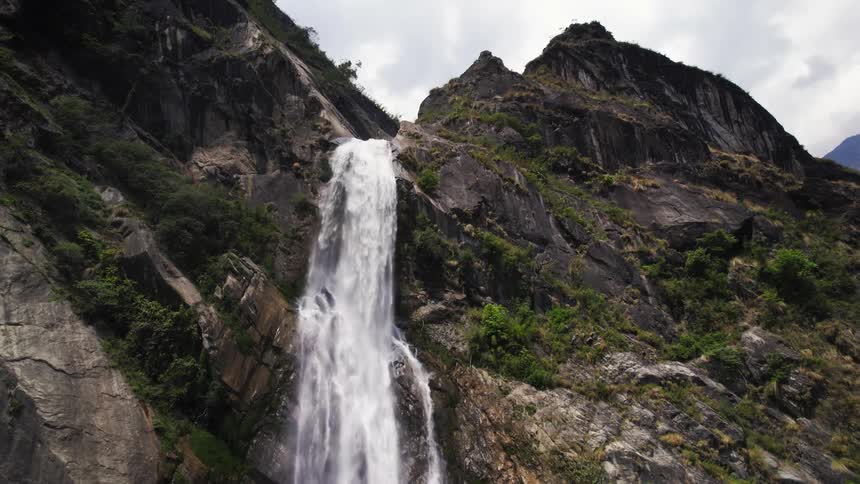 Huge mountain with waterfall mosses and plants