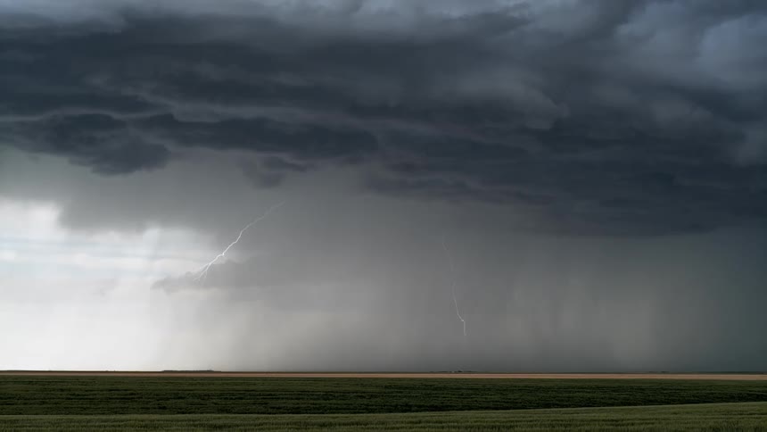 Lightning strikes while the sky is cloudy