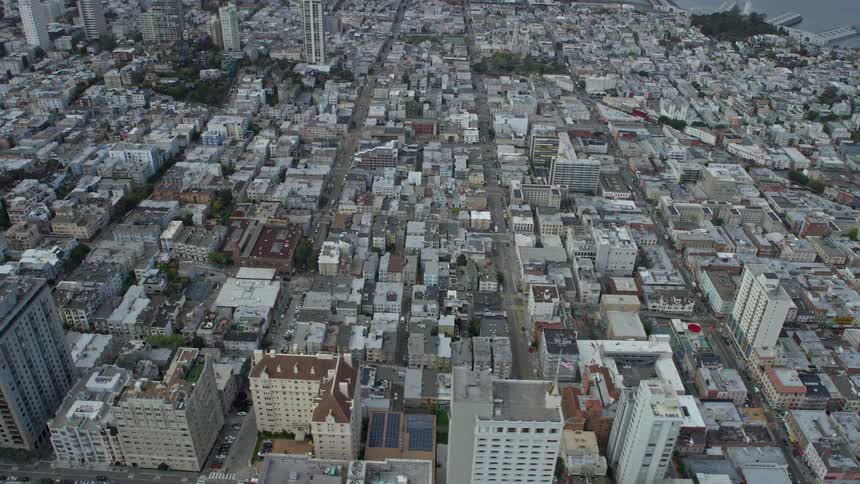  aerial footage capturing a side view of San Francisco's Chinatown and Nob Hill neighborhoods on a cloudy day in the Bay Area California