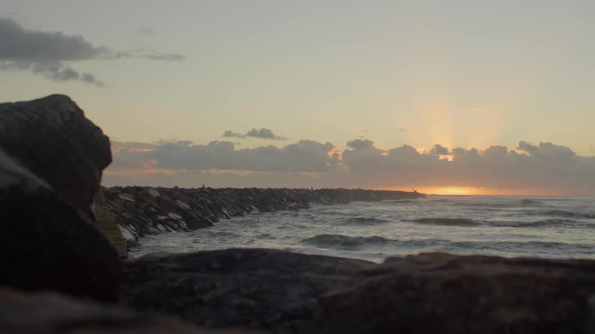 Landscape of body of water at sunset