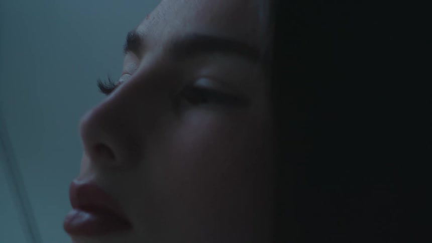 Modeling woman with makeup looking forward