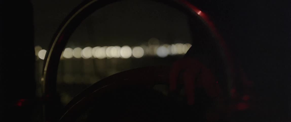 The lights beyond are blurry at night