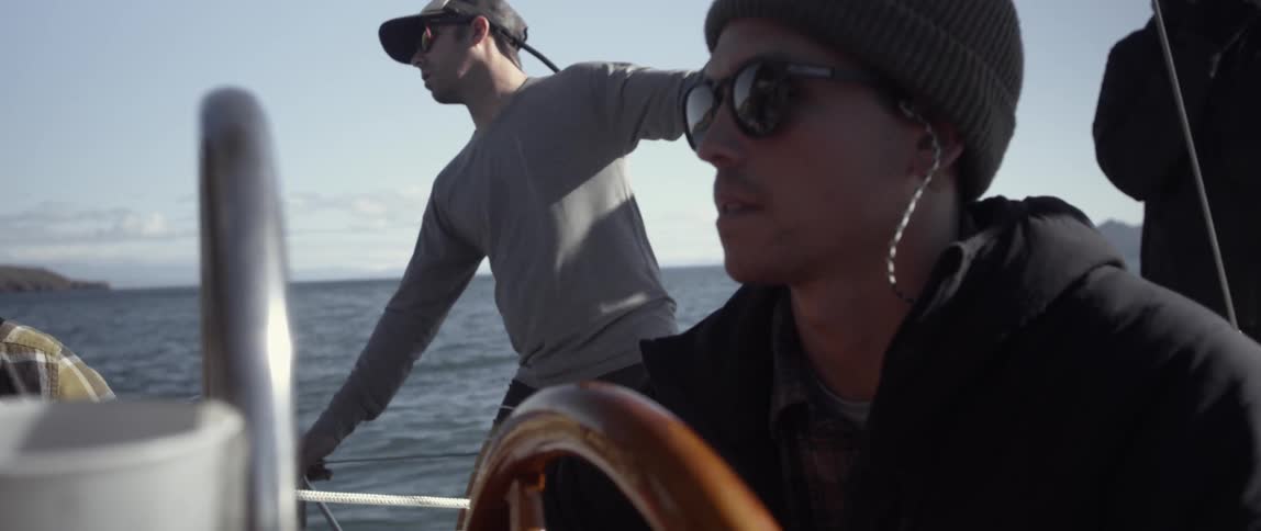 Men ride on a boat