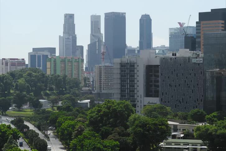 Construction site rises over a modern city