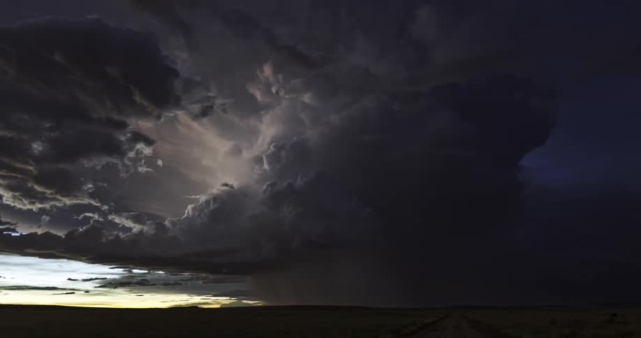 Storm with dark clouds thunderclaps and rain