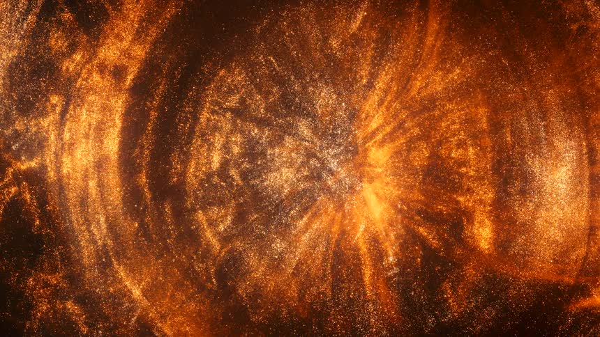 An orange sunlike atmosphere glows in the darkness as rings of sparkling ripples move across the surface