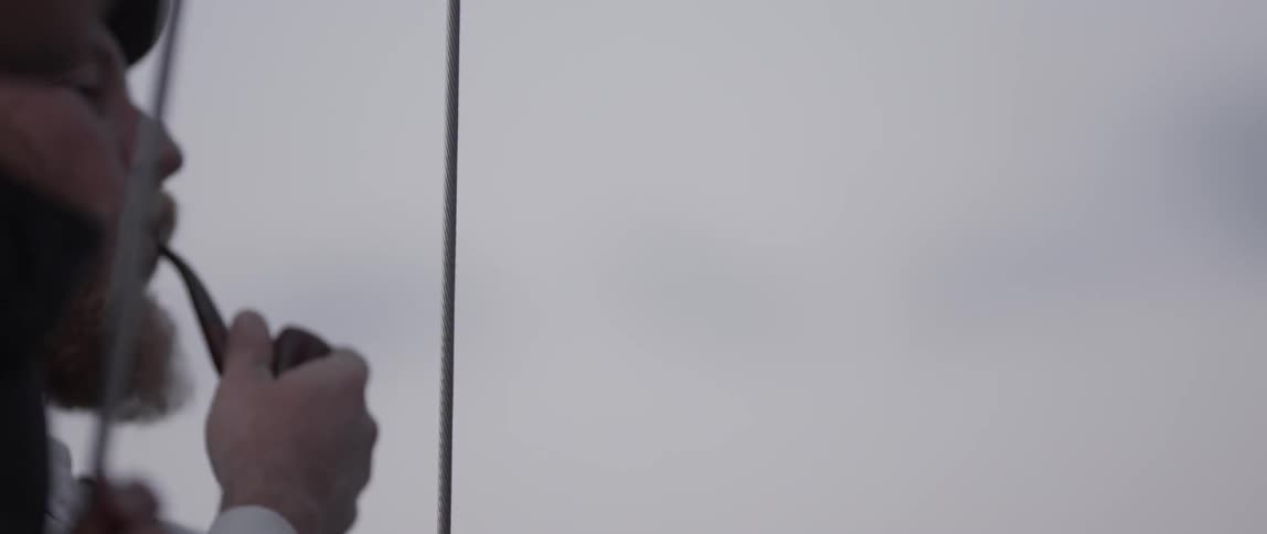 A man is smoking a pipe