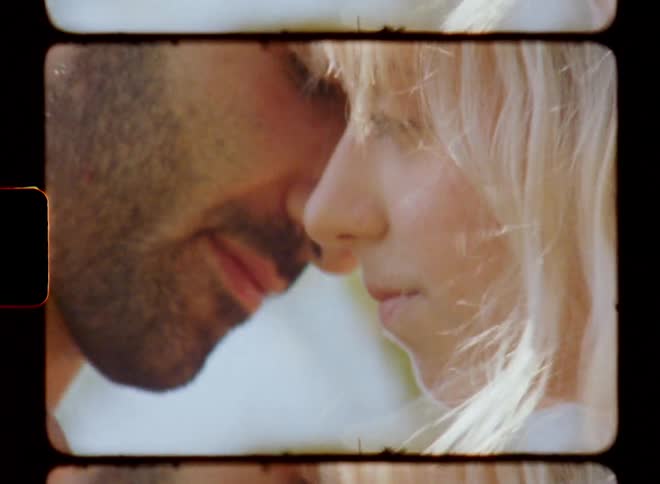 Man and woman with their faces close to each other in a romantic tone