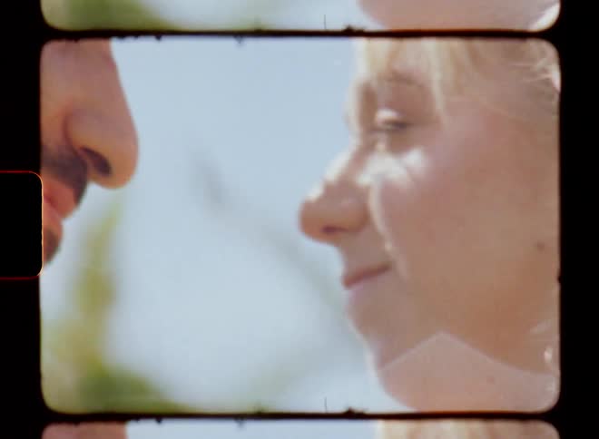 A couple embracing and gazing romantically at each other