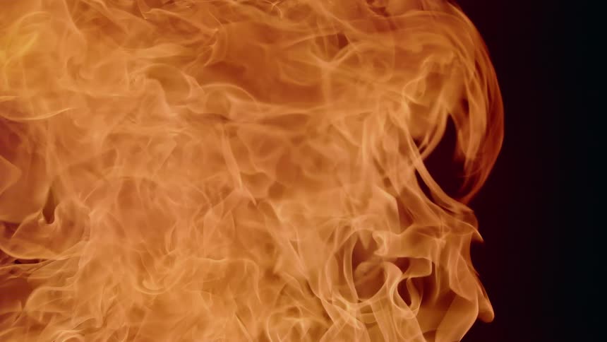 An explosion of flames in a dark environment