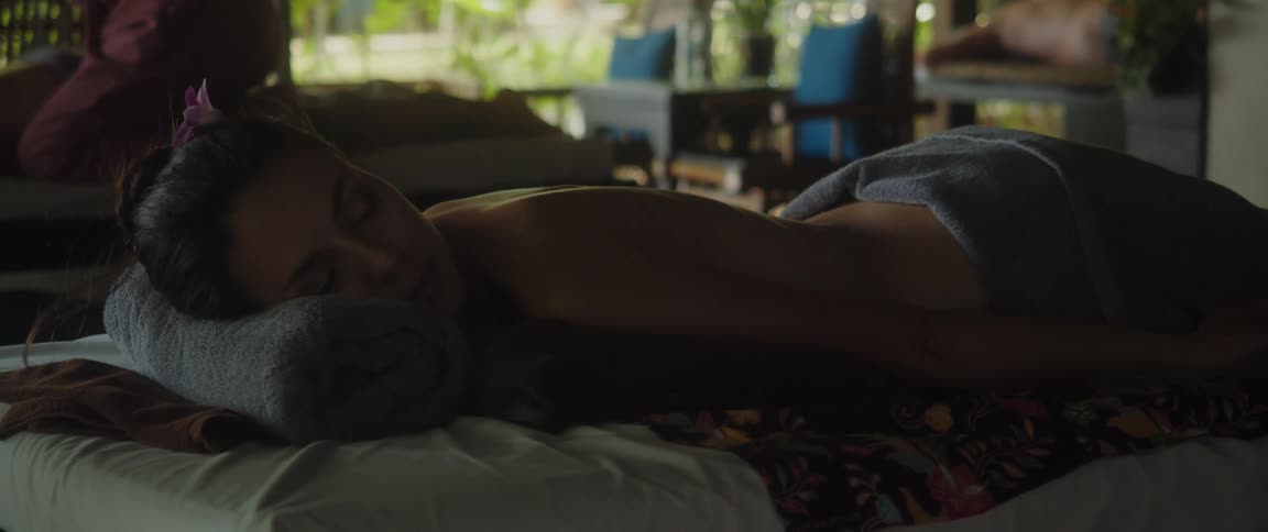 Woman lying on a spa bed sleeping