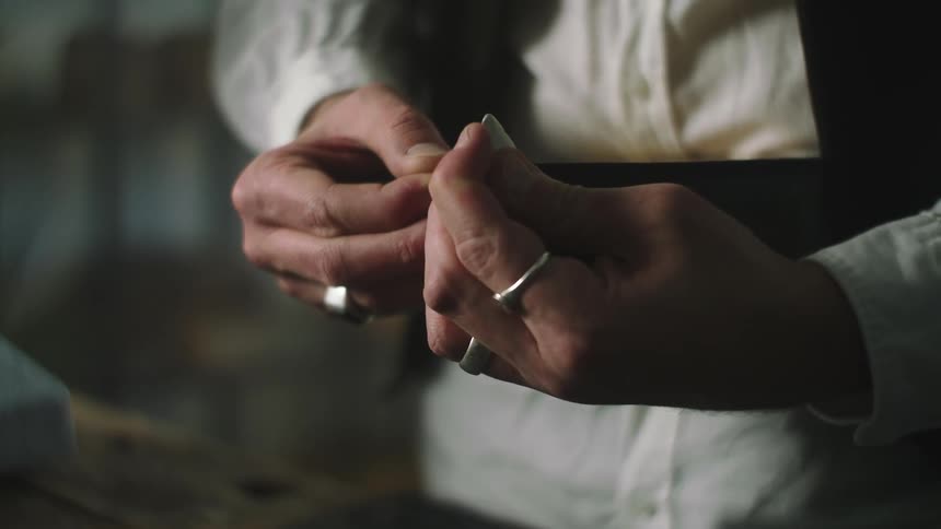 Closeup of hands performing manufacturing work