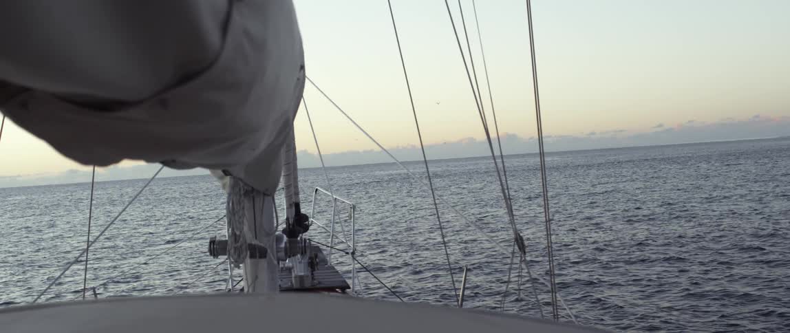 The sail on this boat is down