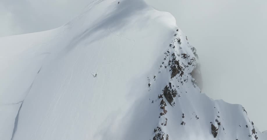 People skiing on a snowcovered mountain