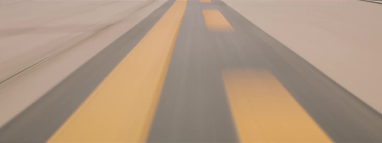 The camera speeds along a runway before it suddenly bounces around sporadically