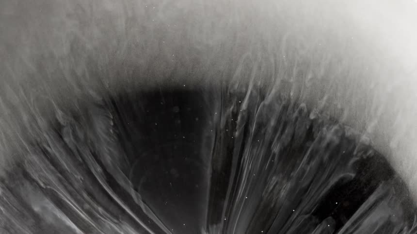 A liquid flowing upward in a circular wave