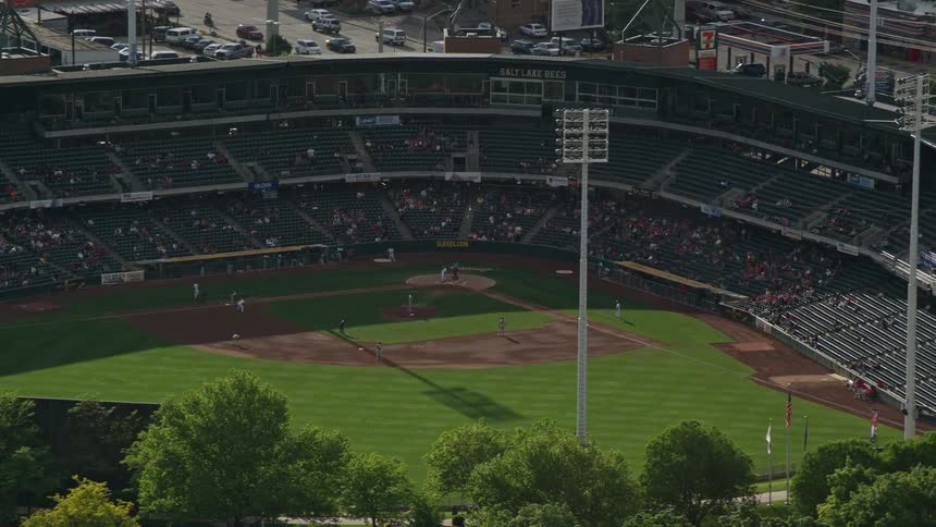  aerial footage of Spring Mobile Ballpark with players on the field during a baseball game in Salt Lake City Utah