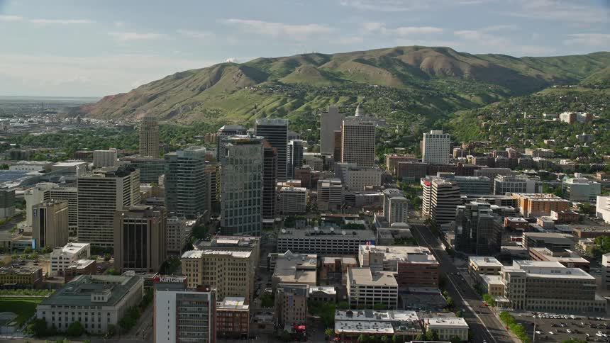 Aerial view of Downtown Salt Lake City and Utah State Capitol building during sunny daytime