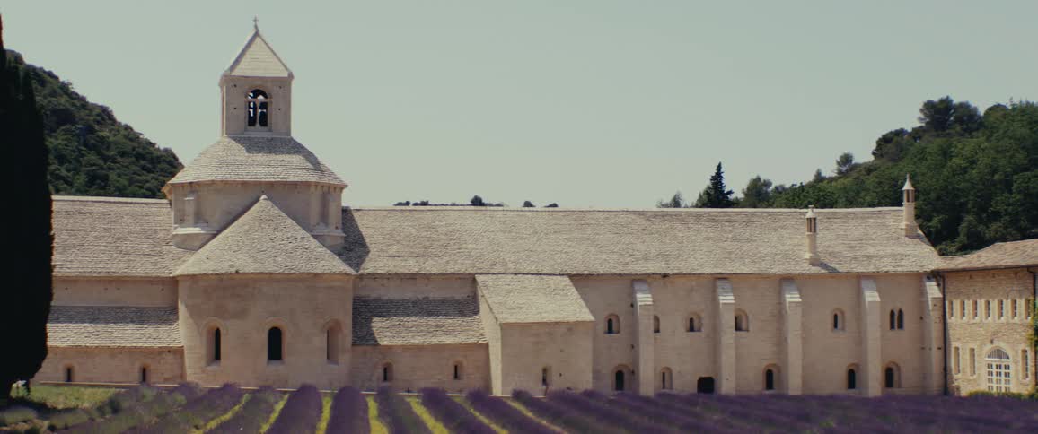 Temple of a church and purple flowers in the field