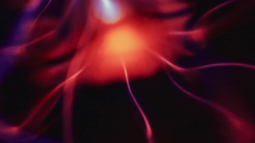 Special abstract effect of neon rays moving on a black background