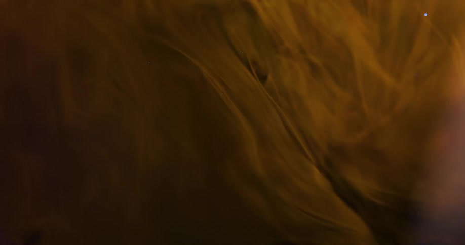 Densely textured liquid in motion with small abstract sparkling blue particles