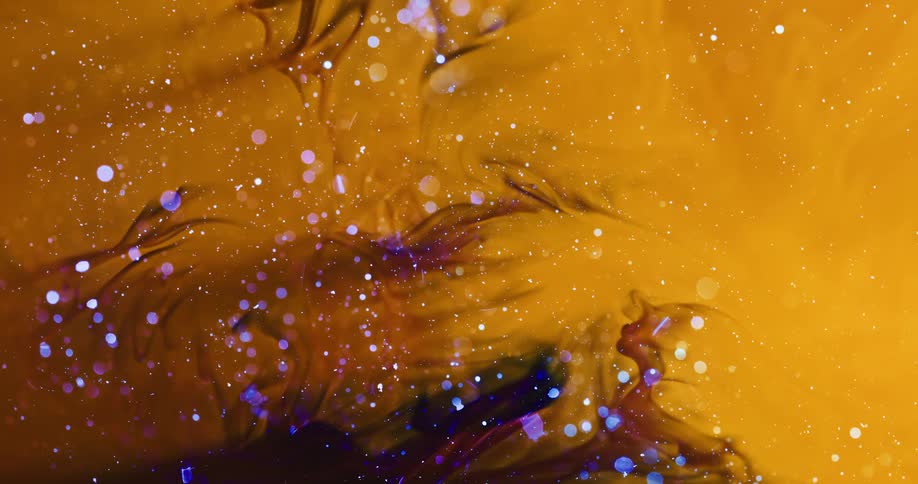 Blue bubbles float past plants underwater