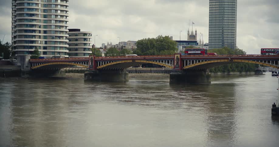 Vehicles passing over the River Thames on Vauxhall Brige