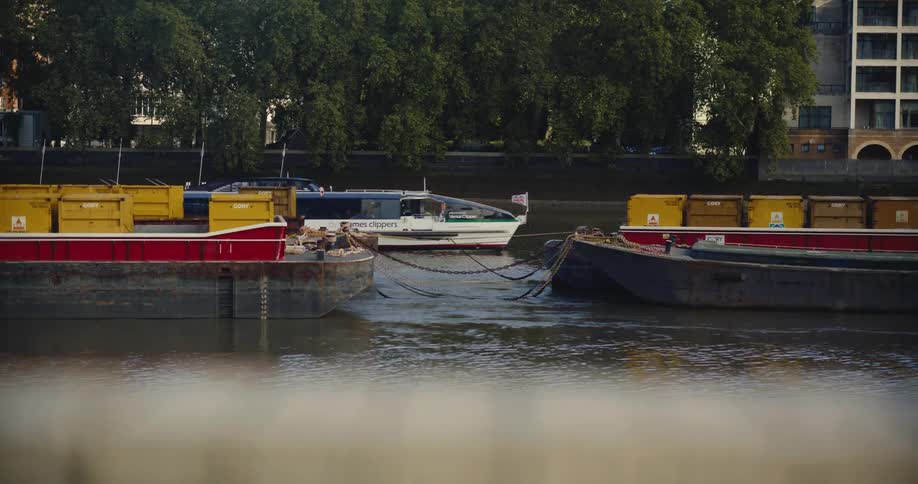 Thames Clipper boat sailing along the River Thames in London