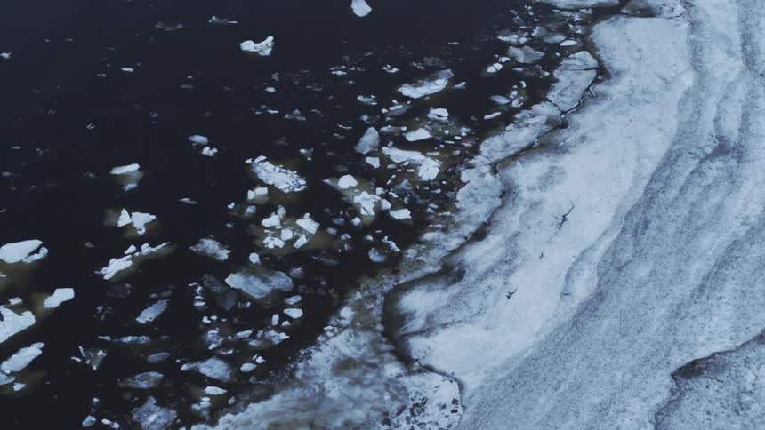 Ice chunks float in the water