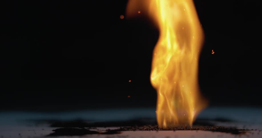 Fire burns on the ground