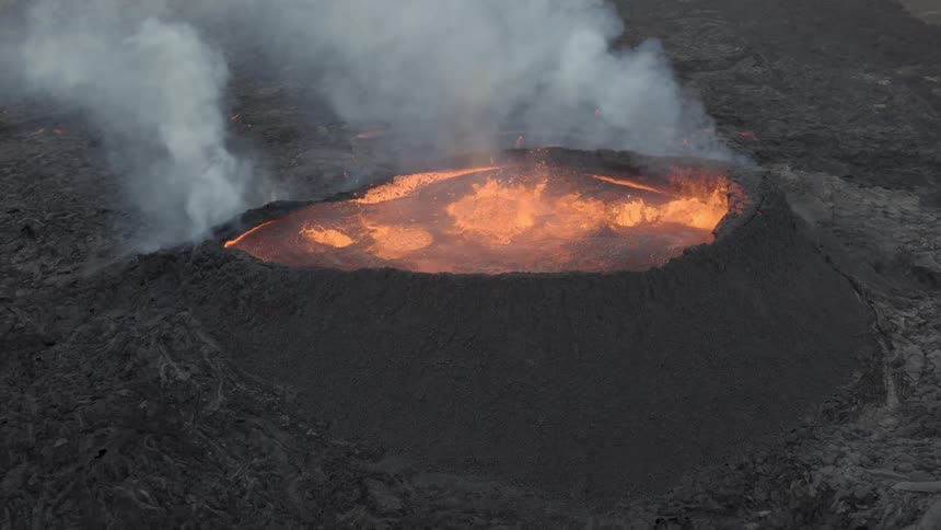 Aerial view of an erupting volcano