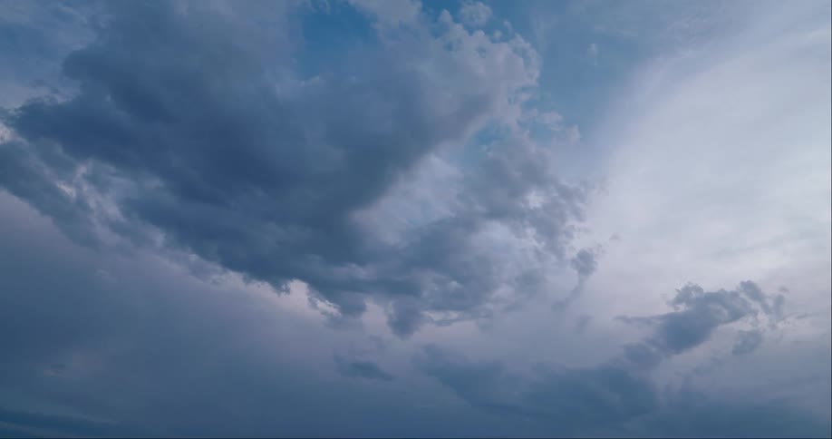 Blue sky above white clouds