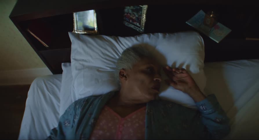 A lady sleeping in bed alone