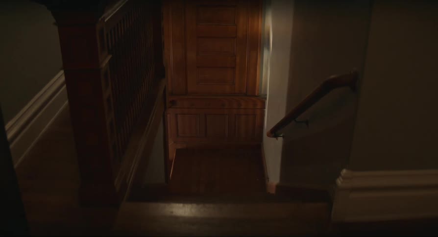 Wood paneling at the end of stairwell