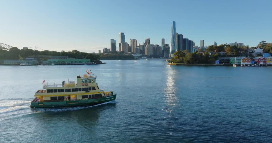 Boat navigating on a lake on the outskirts of a metropolis