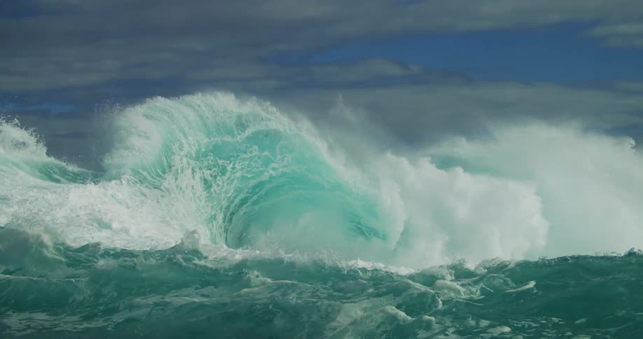 Ocean waves curling and crashing