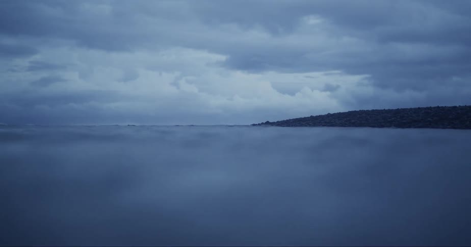 Small waves on the water body at dawn