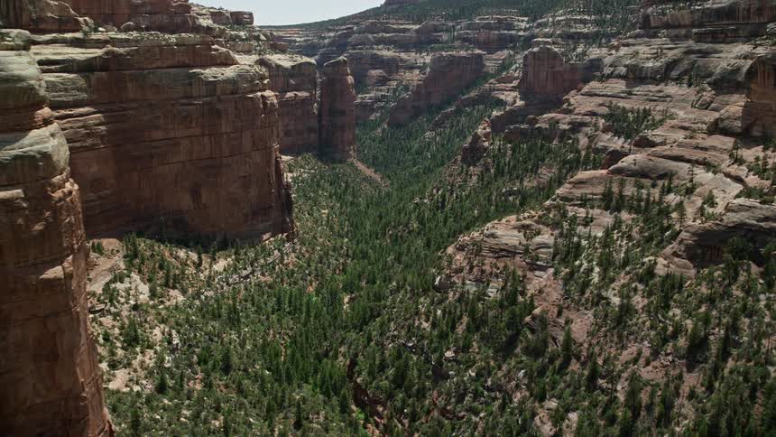 an aerial journey through Arch Canyon Utah as we fly descend and explore the stunning natural landscapes of the Southwest United States