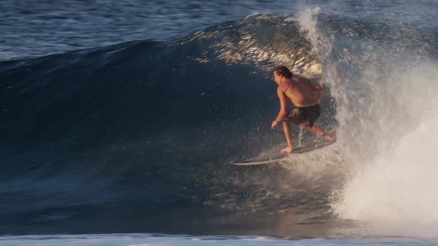 Man surfing a small wave